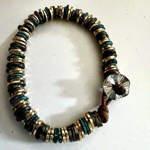 Bracelet women’s multi colored greens and gold secure closure